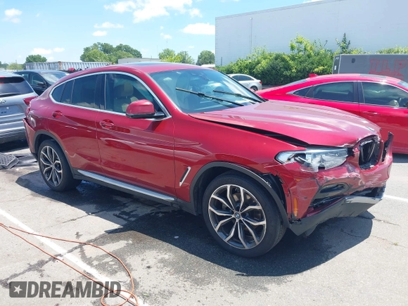 2021 BMW X4 xDrive30i with VIN 5UX2V1C07M9F59530, listed as a IAAI auction lot 42484957 with Not provided miles and . Bid and sale history available at DreamBid. Image 1.