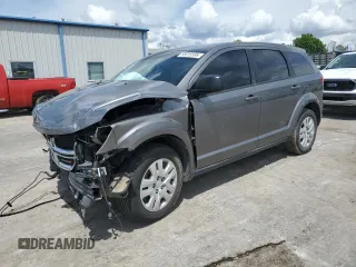 2013 Dodge Journey American Value z VIN 3C4PDCAB1DT733042, wystawiony jako Copart lot #55615595 z przebiegiem Nie podano mil oraz Szkoda całkowita • Salvage title. Historia ofert i sprzedaży dostępna na DreamBid. Obrazek 1.