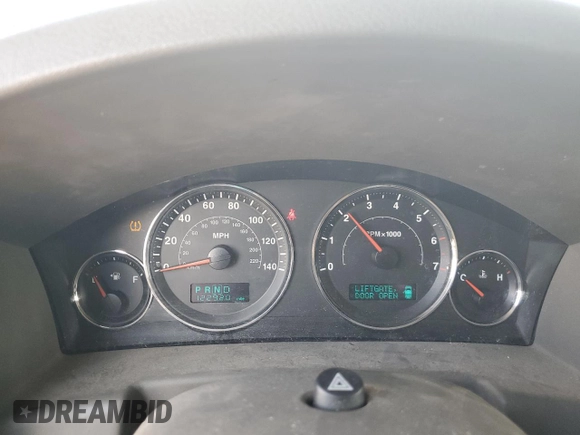 2006 Jeep Commander with VIN 1J8HG48K06C319278, listed as a Copart auction lot 60560225 with 122,920 mi miles and Salvage title. Bid and sale history available at DreamBid. Image 9.