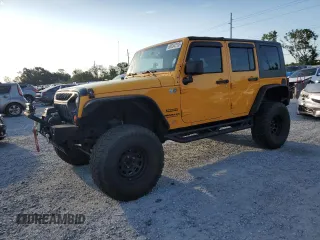 2013 Jeep Wrangler Unlimited Sport with VIN 1C4BJWDG1DL505503, listed as a Copart auction lot 65834115 with 140,169 mi miles and Clean title. Bid and sale history available at DreamBid. Image 1.