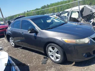 2009 Acura TSX z VIN JH4CU26649C009450, wystawiony jako IAAI lot #41964036 z przebiegiem 282 890 mil mil oraz . Historia ofert i sprzedaży dostępna na DreamBid. Obrazek 13.