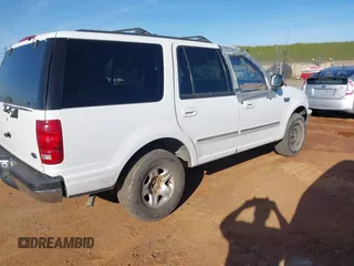 1998 Ford Expedition XLT with VIN 1FMRU1768WLA48604, listed as a IAAI auction lot 41642384 with 274,424 mi miles. Bid and sale history available at carsss.com. Image 4.