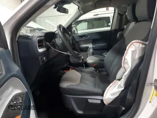 2023 Ford Maverick XL with VIN 3FTTW8F90PRA63156, listed as a Copart auction lot 51825665 with 27,319 mi miles and Salvage title. Bid and sale history available at DreamBid. Image 7.