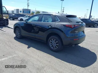 2024 Mazda CX-30 2.5 S with VIN 3MVDMBAM5RM687164, listed as a IAAI auction lot 41465592 with 4,705 mi miles. Bid and sale history available at carsss.com. Image 3.