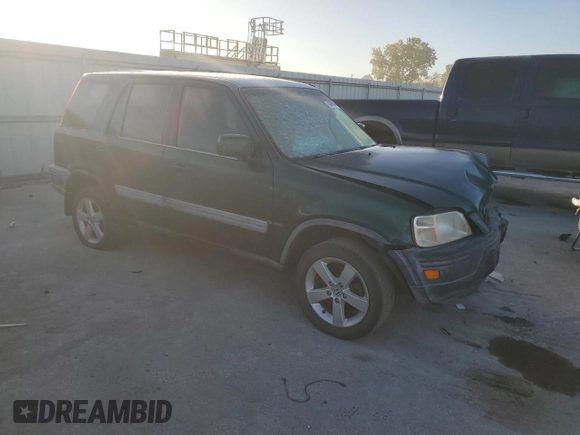 2000 Honda CR-V EX with VIN JHLRD1863YC017768, listed as a Copart auction lot 76383504 with 223,753 mi miles and Salvage Title. Bid and sale history available at carsss.com. Image 4.