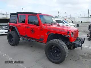 2018 Jeep Wrangler Unlimited Rubicon with VIN 1C4HJXFG4JW156506, listed as a IAAI auction lot 42246880 with 57,062 mi miles and . Bid and sale history available at DreamBid. Image 1.