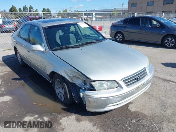 2001 Toyota Camry LE z VIN JT2BF22KX10342454, wystawiony jako IAAI lot #41939743 z przebiegiem 124 045 mil mil oraz . Historia ofert i sprzedaży dostępna na DreamBid. Obrazek 6.