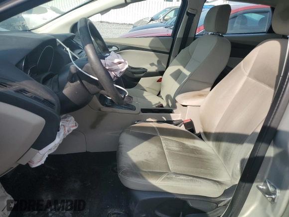 2016 Ford Focus SE z VIN 1FADP3F20GL267077, wystawiony jako Copart lot #53649665 z przebiegiem 106 329 mil mil oraz Szkoda całkowita • Salvage title. Historia ofert i sprzedaży dostępna na DreamBid. Obrazek 7.