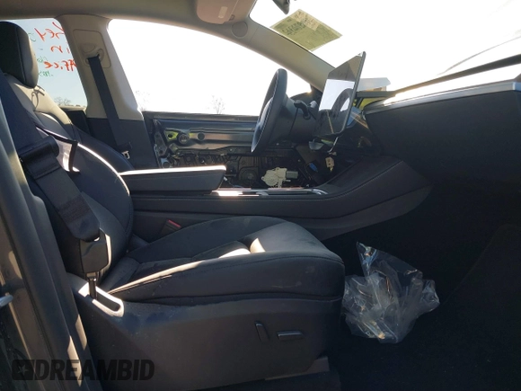 2024 Tesla Model Y with VIN 7SAYGDED3RF092501, listed as a IAAI auction lot 40820923 with 4,688 mi miles and . Bid and sale history available at DreamBid. Image 5.