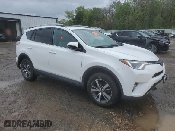 2018 Toyota RAV4 XLE with VIN 2T3WFREV9JW405921, listed as a Copart auction lot 50695175 with 133,019 mi miles and Salvage Title. Bid and sale history available at carsss.com. Image 4.