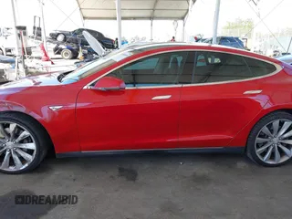 2013 Tesla Model S with VIN 5YJSA1DN8DFP25774, listed as a IAAI auction lot 41998095 with 135,671 mi miles and . Bid and sale history available at carsss.com. Image 15.