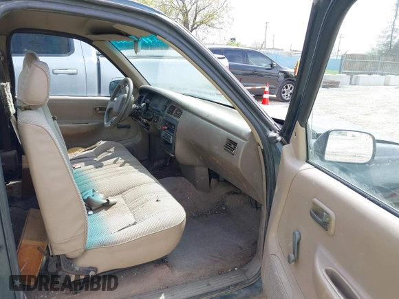 1993 Toyota T100 DX with VIN JT4VD10AXP0012790, listed as a IAAI auction lot 42179976 with 215,526 mi miles. Bid and sale history available at carsss.com. Image 5.