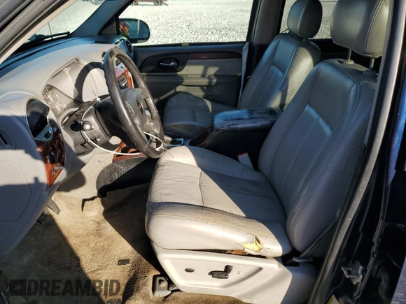 2008 GMC Envoy SLE2 with VIN 1GKDT13S882100069, listed as a Copart auction lot 77164634 with 206,709 mi miles and Salvage Title. Bid and sale history available at DreamBid. Image 7.