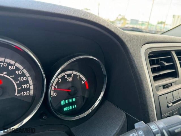 2010 Dodge Caliber SXT with VIN 1B3CB4HA1AD579409, listed as a Copart auction lot 49857695 with 100,311 mi miles and Clean Title. Bid and sale history available at carsss.com. Image 8.