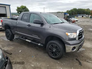 2012 Toyota Tundra 4WD Truck with VIN 5TFUM5F19CX028409, listed as a Copart auction lot 72332464 with 118,584 mi miles and Salvage Title. Bid and sale history available at carsss.com. Image 4.