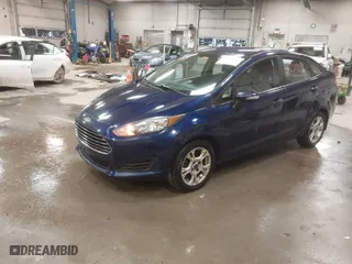 2016 Ford Fiesta SE with VIN 3FADP4BJ0GM112689, listed as a IAAI auction lot 41231939 with 151,844 mi miles. Bid and sale history available at carsss.com. Image 2.