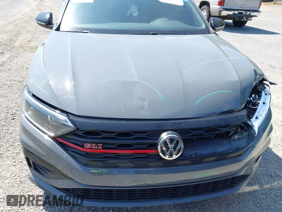 2021 Volkswagen Jetta GLI S z VIN 3VW6T7BU9MM052902, wystawiony jako IAAI lot #42286711 z przebiegiem 91 519 mil mil oraz . Historia ofert i sprzedaży dostępna na DreamBid. Obrazek 22.
