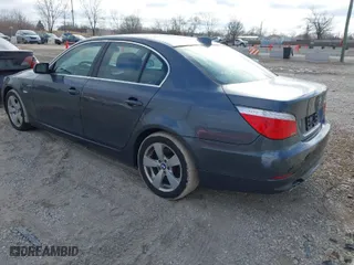 2008 BMW 5 Series 528xi with VIN WBANV13558CZ52729, listed as a IAAI auction lot 41406318 with 165,570 mi miles. Bid and sale history available at carsss.com. Image 3.