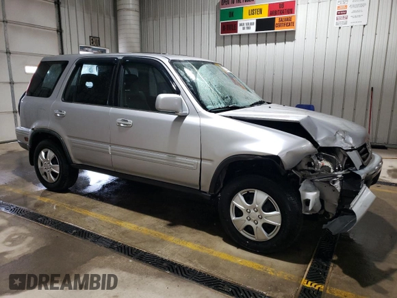 2001 Honda CR-V SE with VIN JHLRD18731C035881, listed as a Copart auction lot 52574575 with 192,107 mi miles and Salvage Title. Bid and sale history available at carsss.com. Image 4.