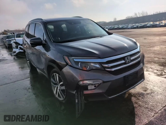 2017 Honda Pilot Touring with VIN 5FNYF6H95HB083610, listed as a Copart auction lot 50806045 with 200,897 mi miles and Salvage Title. Bid and sale history available at DreamBid. Image 14.