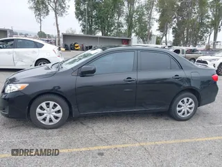 2010 Toyota Corolla with VIN 1NXBU4EE1AZ285449, listed as a IAAI auction lot 42040668 with 121,404 mi miles and . Bid and sale history available at carsss.com. Image 14.