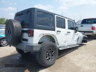 2012 Jeep Wrangler Unlimited Sport with VIN 1C4BJWDG7CL273102, listed as a IAAI auction lot 42288975 with 155,153 mi miles and . Bid and sale history available at DreamBid. Image 4.