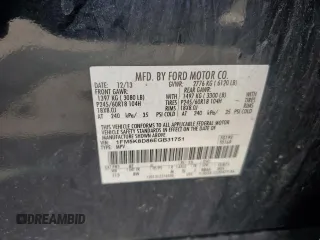 2014 Ford Explorer XLT z VIN 1FM5K8D86EGB31751, wystawiony jako Copart lot #56300825 z przebiegiem 156 764 mil mil oraz Szkody całkowita. Historia ofert i sprzedaży dostępna na DreamBid. Obrazek 13.