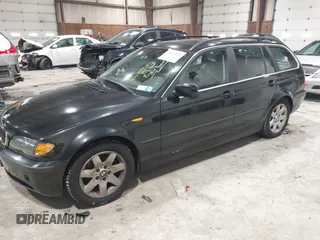 2004 BMW 3 Series 325xi with VIN WBAEP33464PF04602, listed as a IAAI auction lot 41634556 with 92,408 mi miles. Bid and sale history available at carsss.com. Image 2.