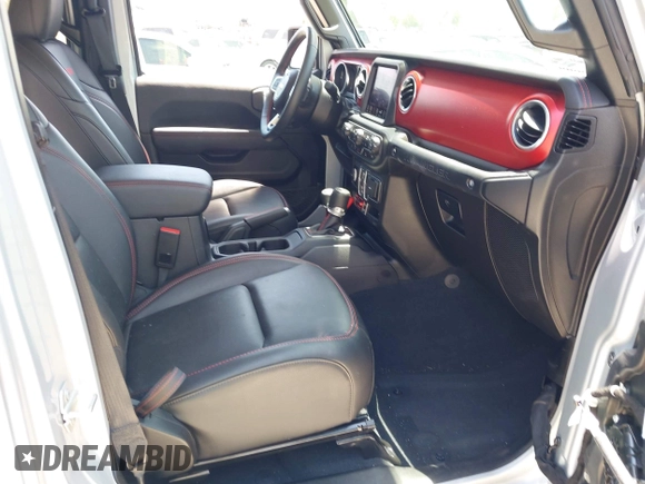 2023 Jeep Wrangler Rubicon with VIN 1C4JJXFG0PW522651, listed as a IAAI auction lot 42112210 with 7,744 mi miles and . Bid and sale history available at DreamBid. Image 5.