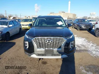 2021 Hyundai Palisade SEL z VIN KM8R2DHE4MU263983, wystawiony jako IAAI lot #41409884 z przebiegiem 130 702 mil mil oraz . Historia ofert i sprzedaży dostępna na DreamBid. Obrazek 12.