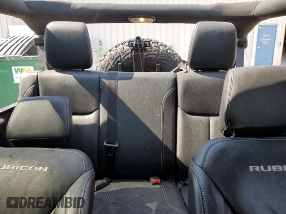 2016 Jeep Wrangler Unlimited Rubicon with VIN 1C4BJWFG8GL192077, listed as a Copart auction lot 58339005 with 62,076 mi miles and Salvage title. Bid and sale history available at DreamBid. Image 10.