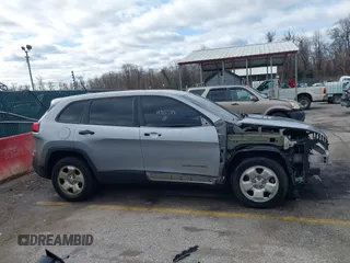 2014 Jeep Cherokee Sport with VIN 1C4PJLAB5EW268916, listed as a IAAI auction lot 41715729 with 116,544 mi miles and . Bid and sale history available at DreamBid. Image 14.