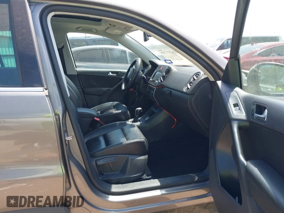 2011 Volkswagen Tiguan SEL w/Premium Navi with VIN WVGAV7AX0BW550059, listed as a IAAI auction lot 42071719 with 107,341 mi miles and . Bid and sale history available at DreamBid. Image 5.