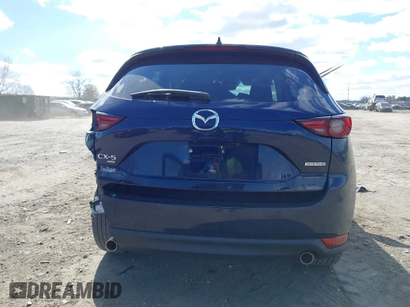 2020 Mazda CX-5 Grand Touring with VIN JM3KFBDM2L0768770, listed as a IAAI auction lot 41695058 with 44,192 mi miles. Bid and sale history available at carsss.com. Image 15.