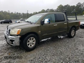 2004 Nissan Titan LE with VIN 1N6AA07A44N524855, listed as a Copart auction lot 73486464 with 322,599 mi miles and Salvage Title. Bid and sale history available at DreamBid. Image 1.