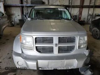 2010 Dodge Nitro SXT z VIN 1D4PU5GK7AW112562, wystawiony jako Copart lot #45113225 z przebiegiem 150 183 mil mil oraz Szkoda całkowita • Salvage title. Historia ofert i sprzedaży dostępna na DreamBid. Obrazek 5.