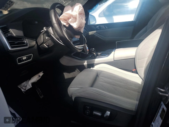 2023 BMW X5 xDrive40i with VIN 5UXCR6C07P9R18608, listed as a Copart auction lot 55911595 with Not provided miles and Salvage title. Bid and sale history available at DreamBid. Image 7.