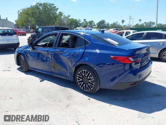 2025 Toyota Camry LE with VIN 4T1DAACK3SU104152, listed as a IAAI auction lot 42039337 with 1,423 mi miles and . Bid and sale history available at DreamBid. Image 3.