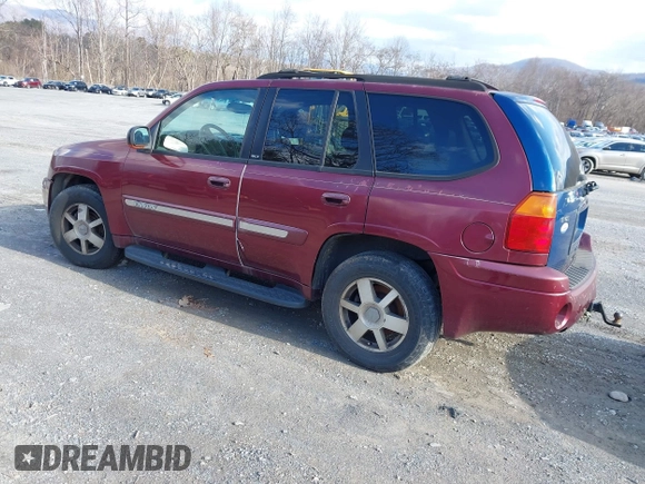 2004 GMC Envoy SLE with VIN 1GKDS13S342287315, listed as a IAAI auction lot 41486715 with 186,129 mi miles. Bid and sale history available at carsss.com. Image 3.