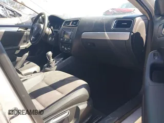 2012 Volkswagen Jetta TDI w/Premium with VIN 3VWLL7AJ8CM314305, listed as a IAAI auction lot 41885355 with 75,669 mi miles and . Bid and sale history available at DreamBid. Image 5.