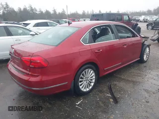 2016 Volkswagen Passat SE z VIN 1VWBT7A31GC023486, wystawiony jako IAAI lot #41205417 z przebiegiem 90 005 mil mil oraz . Historia ofert i sprzedaży dostępna na DreamBid. Obrazek 4.