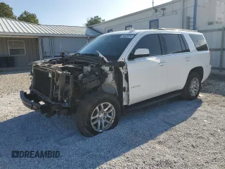 2018 Chevrolet Tahoe LS z VIN 1GNSKAKC5JR386192, wystawiony jako Copart lot #42802055 z przebiegiem 128 349 mil mil oraz Szkoda całkowita • Salvage title. Historia ofert i sprzedaży dostępna na DreamBid. Obrazek 1.