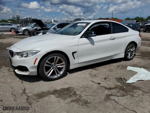 2014 BMW 4 Series 428i xDrive with VIN WBA3N5C52EK197054, listed as a Copart auction lot 71804204 with 168,035 mi miles and Salvage Title. Bid and sale history available at carsss.com. Image 1.