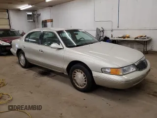 1997 Lincoln Continental with VIN 1LNLM97V3VY701840, listed as a Copart auction lot 84495824 with 166,022 mi miles and Clean Title. Bid and sale history available at carsss.com. Image 4.
