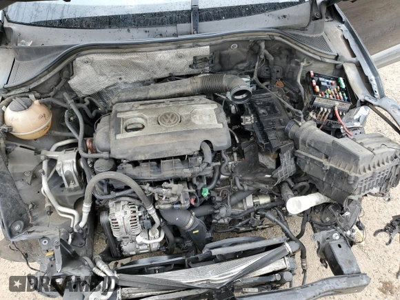 2013 Volkswagen Tiguan SE z VIN WVGAV7AXXDW523728, wystawiony jako Copart lot #64116173 z przebiegiem 116 336 mil mil oraz Szkoda całkowita • Salvage title. Historia ofert i sprzedaży dostępna na DreamBid. Obrazek 13.