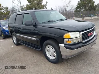 2005 GMC Yukon SLT with VIN 1GKEK13T75R101670, listed as a IAAI auction lot 41490519 with 168,998 mi miles. Bid and sale history available at carsss.com. Image 1.