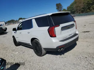 2023 GMC Yukon Denali Ultimate with VIN 1GKS2EKL0PR132029, listed as a Copart auction lot 77234034 with 58,071 mi miles and Salvage Title. Bid and sale history available at carsss.com. Image 2.