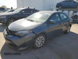 2019 Toyota Corolla L z VIN 5YFBURHE9KP893649, wystawiony jako Copart lot #52818485 z przebiegiem 72 699 mil mil oraz Szkoda całkowita • Salvage title. Historia ofert i sprzedaży dostępna na DreamBid. Obrazek 1.