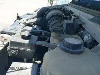 2007 Ford Econoline Cargo Commercial with VIN 1FTNE24L67DB39270, listed as a IAAI auction lot 42270845 with 296,410 mi miles and . Bid and sale history available at DreamBid. Image 19.