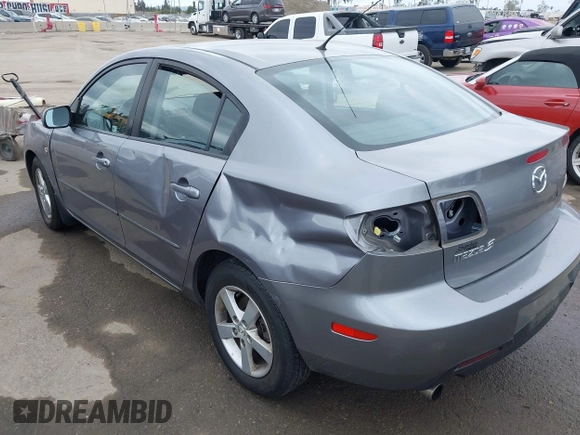 2006 Mazda 3 i with VIN JM1BK12F261420775, listed as a IAAI auction lot 42031576 with 145,530 mi miles. Bid and sale history available at carsss.com. Image 3.